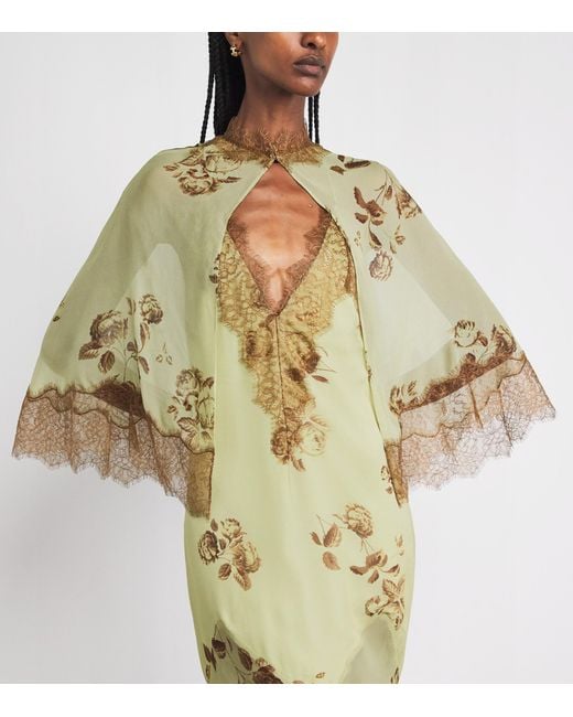 De La Vali Metallic Cielo Maxi Dress With Cape