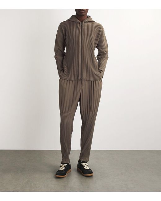 Homme Plissé Issey Miyake Brown Pleated Tapered Trousers for men