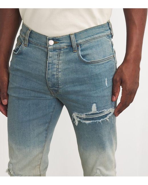 Amiri Blue Distressed Gradient Slim Jeans for men