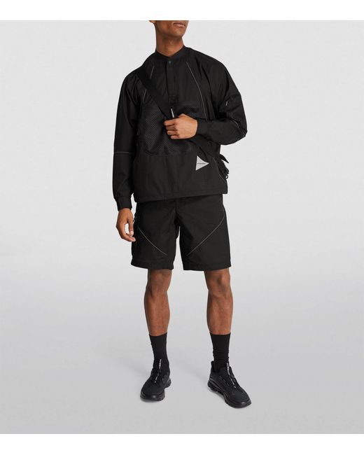And Wander Black Technical Reflective Anorak for men