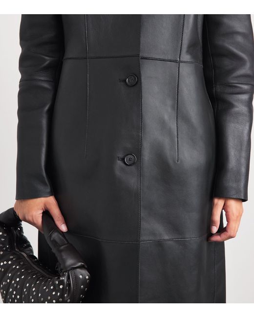 Totême Black Leather Trench Coat