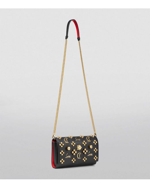 Black Paloma stud-embellished leather clutch bag, Christian Louboutin