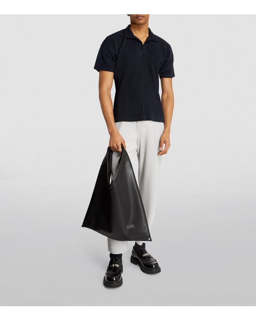 Homme Plissé Issey Miyake Black Pleated Polo Shirt for men