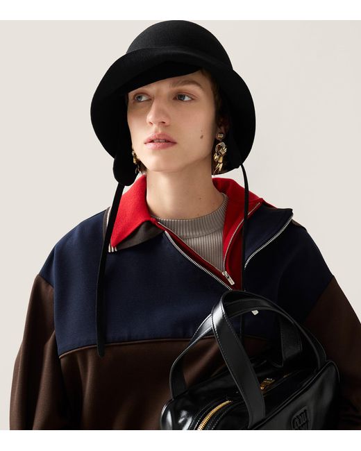 Miu Miu Metallic Metal Bow Earrings