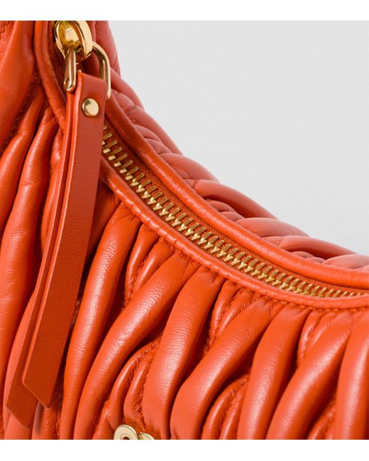 Miu Miu Orange Small Matelassé Leather Wander Top-Handle Bag