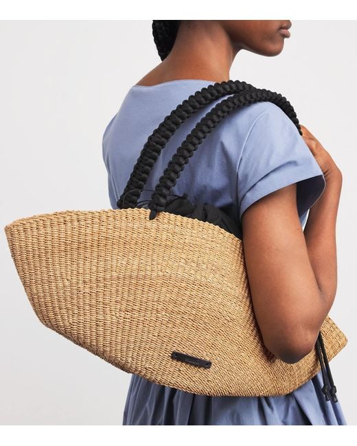 Muuñ Metallic Straw Shell Tote Bag
