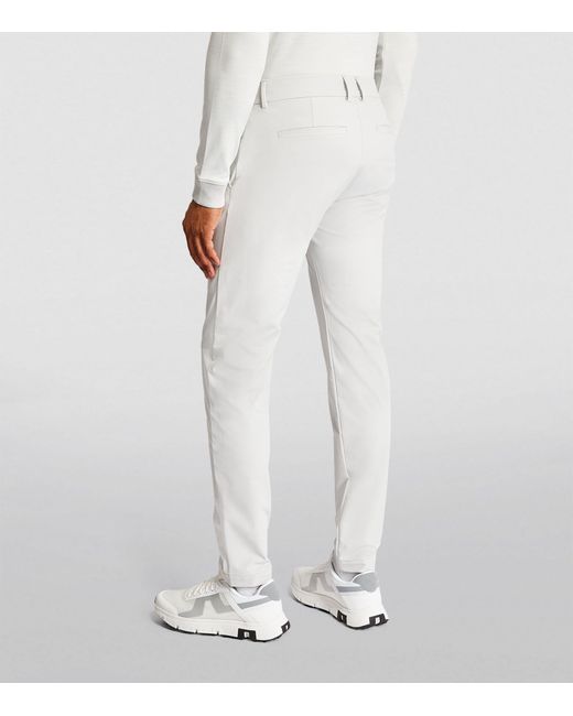Kjus White Super-stretch Ike Slim Trousers for men