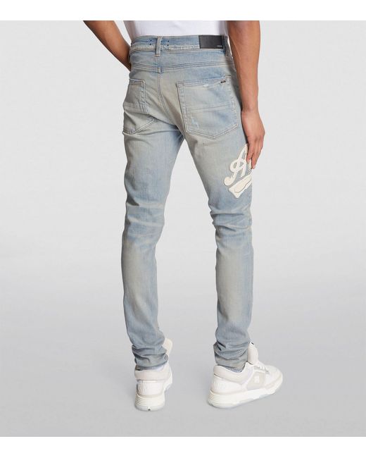 Amiri Logo Varsity Skinny Jeans in Blue for Men Lyst Canada