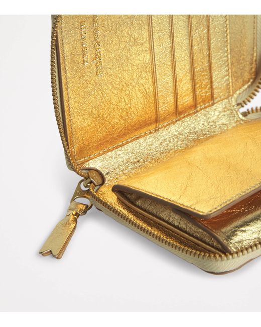 Comme des Garçons Metallic Leather Embossed Logo Zipped Wallet for men