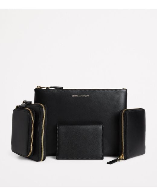 Comme des Garçons Black Leather Zipped Wallet for men