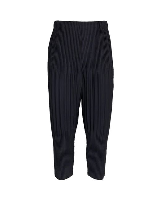 Homme Plissé Issey Miyake Black Pleated Tapered Trousers for men