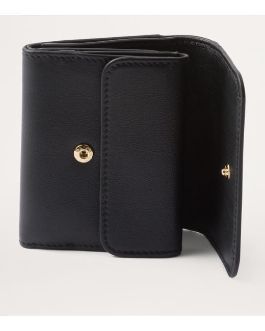 Prada Small Leather Trifold Wallet in Black Lyst UK