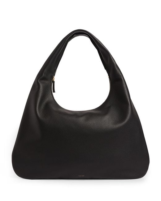 The Row Medium Leather Everyday Shoulder Bag in Black | Lyst