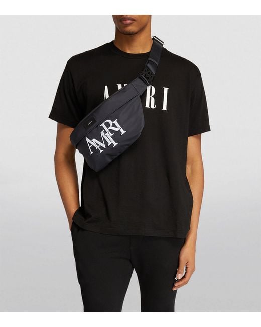 Amiri Black Staggered Logo Belt Bag for men