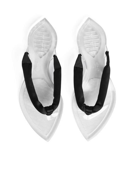 Alaïa Black Invisible Thong Flip Flops