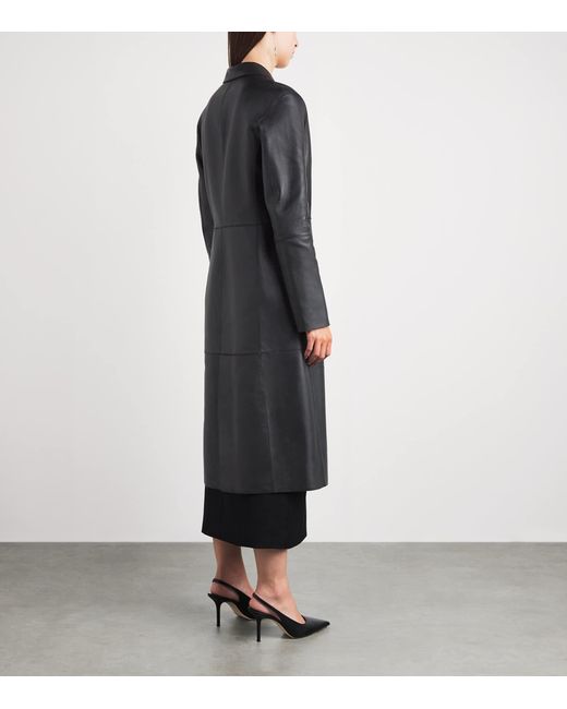 Totême Black Leather Trench Coat