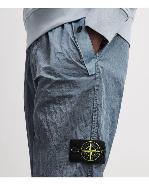 Stone Island Blue Metal Nylon Track Pants for men