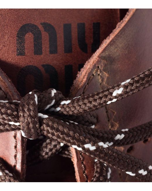 Miu Miu Brown Leather Plume Sneakers