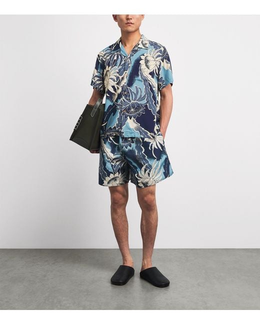 J.W. Anderson Blue Floral Print Swim Shorts for men