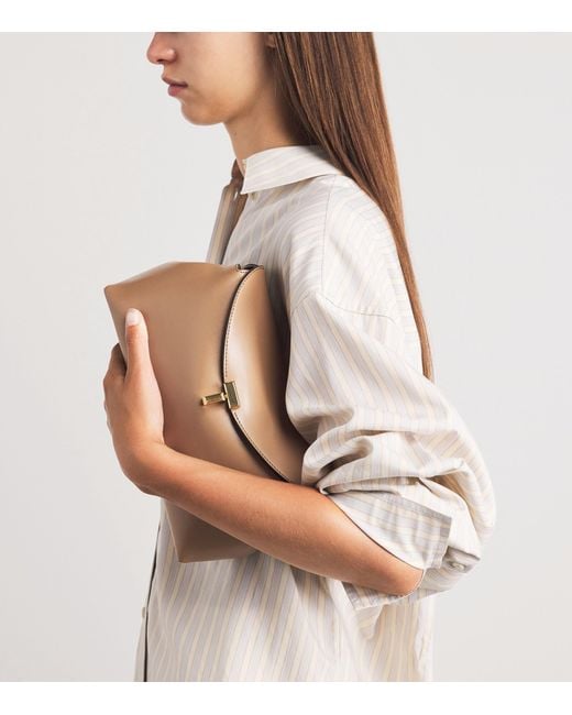 Totême Brown Leather T-Lock Clutch Bag