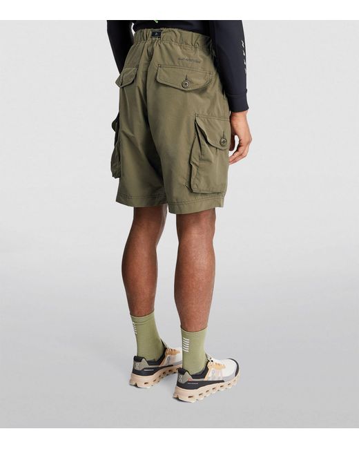 And Wander Green Oversized Cargo Shorts for men