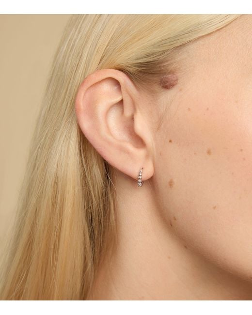 Astrid & Miyu White Heart Huggie Earrings