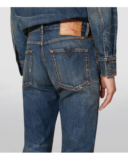 Valentino Garavani Blue Distressed Slim Jeans for men