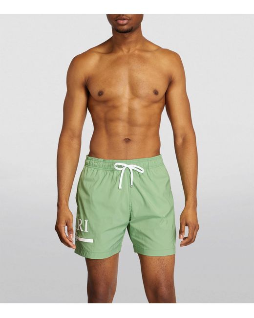 Amiri Green Logo Swim Shorts for men