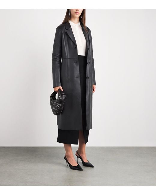 Totême Black Leather Trench Coat