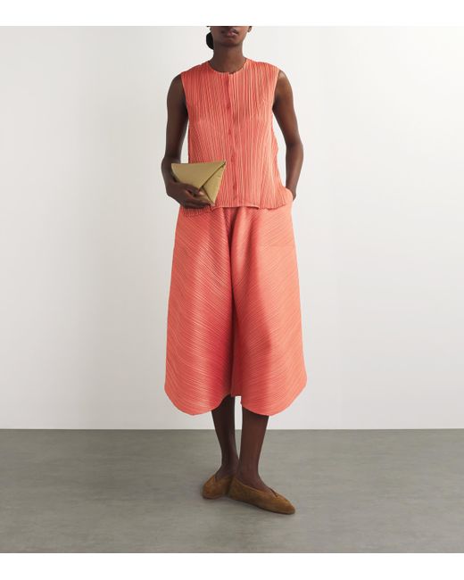 Pleats Please Issey Miyake Cropped Solar Flare Trousers in Pleats Please Issey Miyake Cropped Solar Flare Trousers in