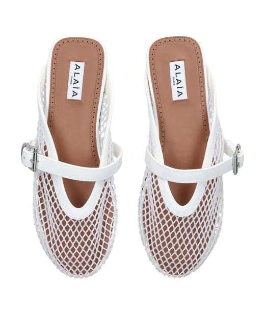 Alaïa White Patent Leather Fishnet Mules