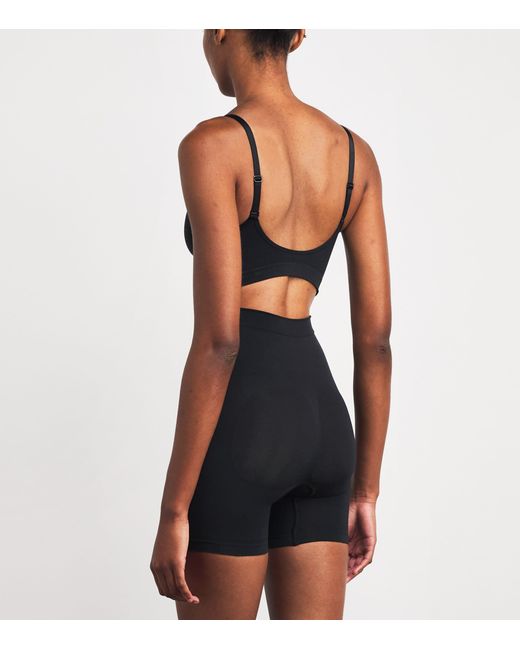 Skims Black Seamless Sculpt Mid-Thigh Shorts