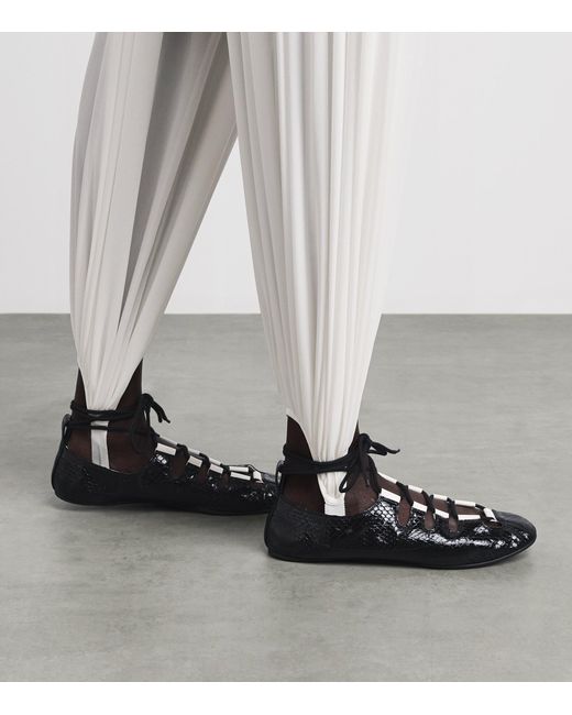 Alaïa Black Snakeskin Lace-Up Ballet Flats
