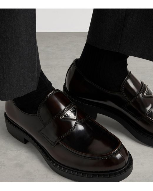 Prada Black Leather Brushed Triangle Loafers for men