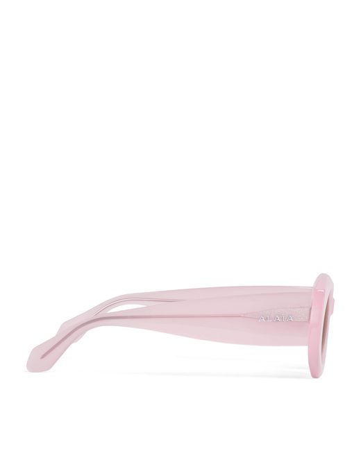 Alaïa Pink Acetate Oval Sunglasses