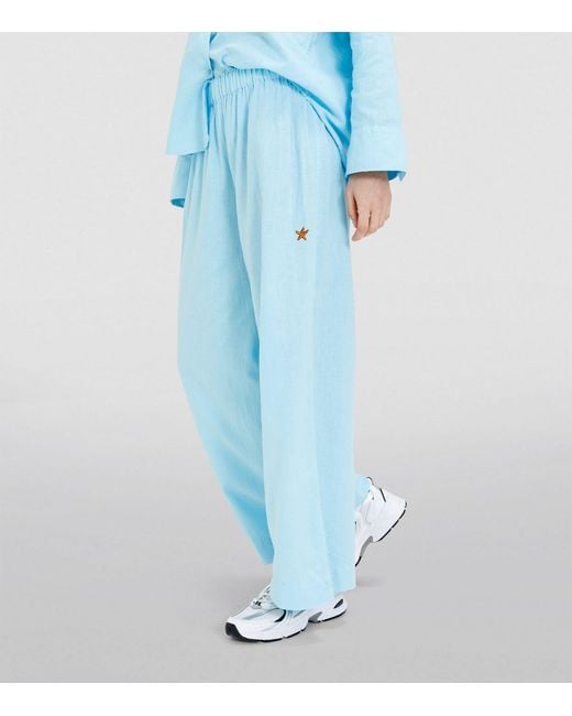Chinti & Parker Blue Surfing Snoopy Pyjama Set
