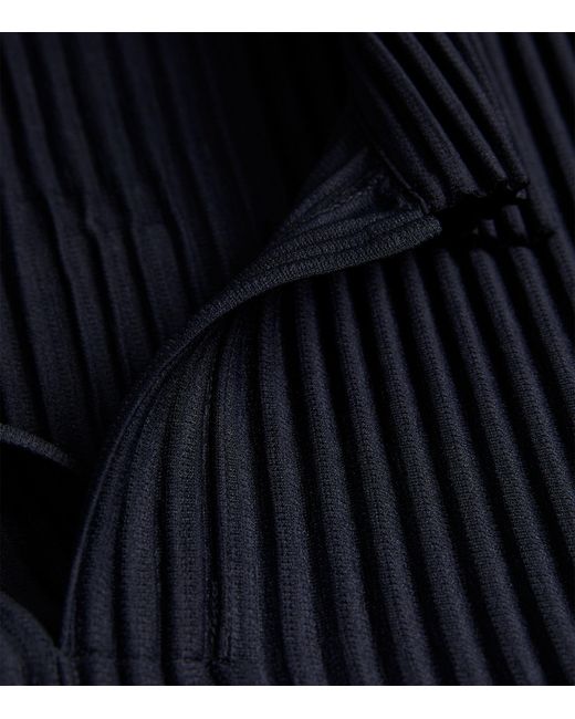 Homme Plissé Issey Miyake Black Pleated Polo Shirt for men