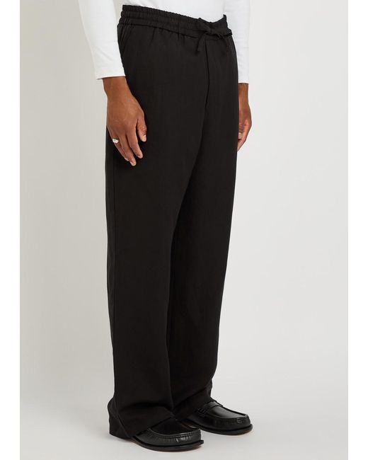 AMI Black Wide-Leg Woven Trousers for men