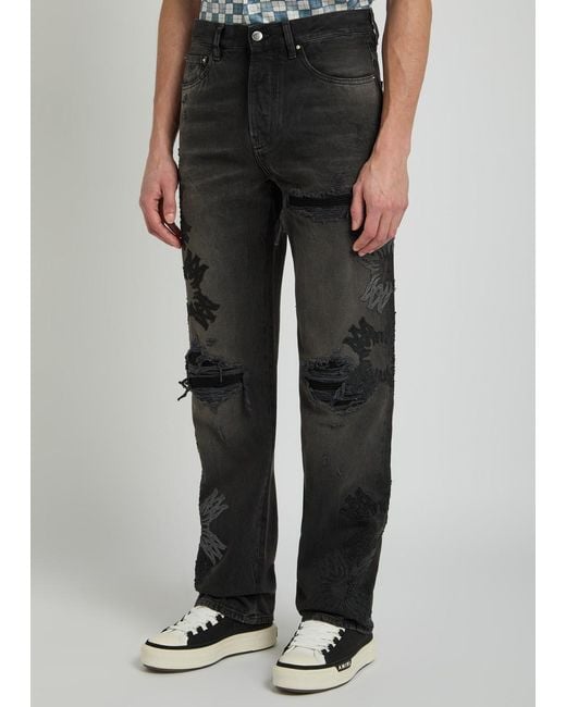 Amiri Black Distressed Logo-Appliquéd Straight-Leg Jeans for men