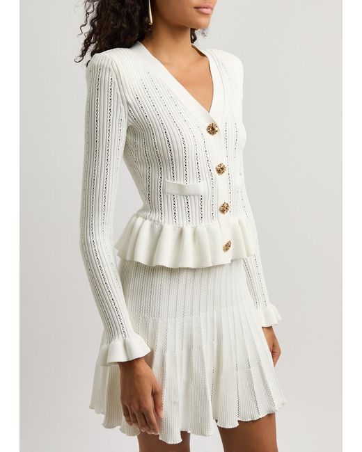 Self-Portrait Ribbed-knit Peplum Mini Dress in White | Lyst