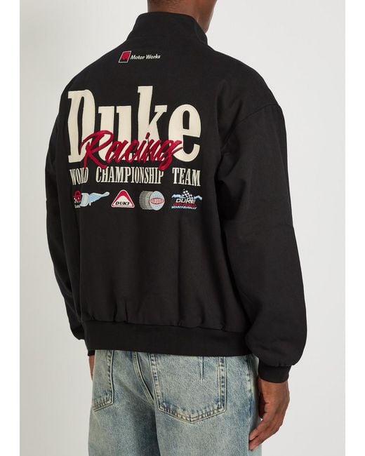 Duke & Dexter Black Racing Patchwork Appliqués Cotton Varsity Jacket for men
