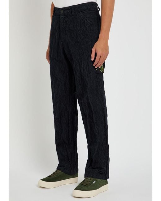 Stone Island Blue Logo Crinkled Tapered-Leg Corduroy Trousers for men