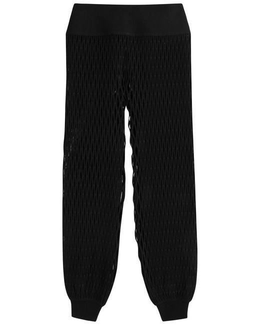 Alaïa Black Open-Knit Stretch-Jersey Trousers
