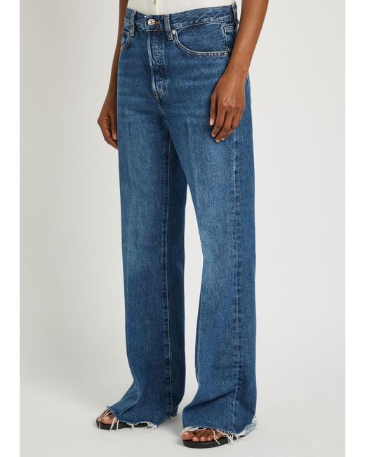FRAME Blue The Lax Distressed Flared-Leg Jeans