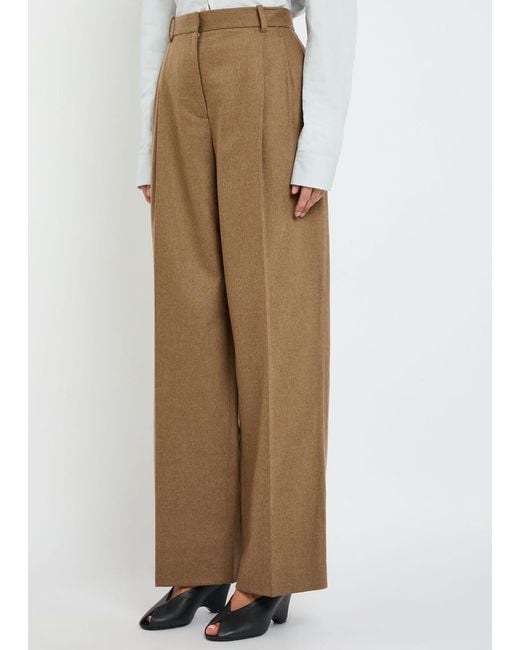 Khaite Natural August Pleated Wool-Blend Trousers