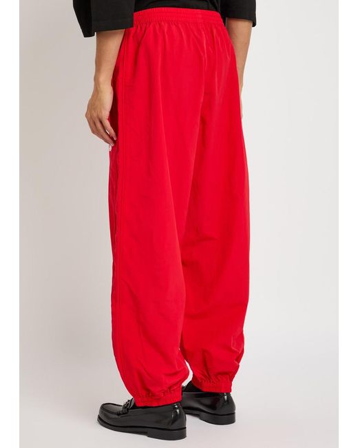 Willy Chavarria Red Bad Boy Shell Track Trousers for men