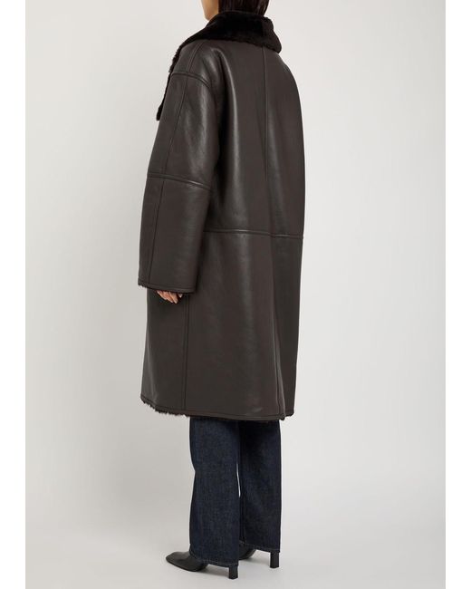 Totême  Black Panelled Shearling Wrap Coat