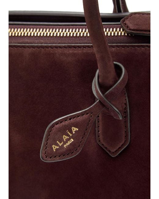 Alaïa Purple Delta Medium Nubuck Top Handle Bag