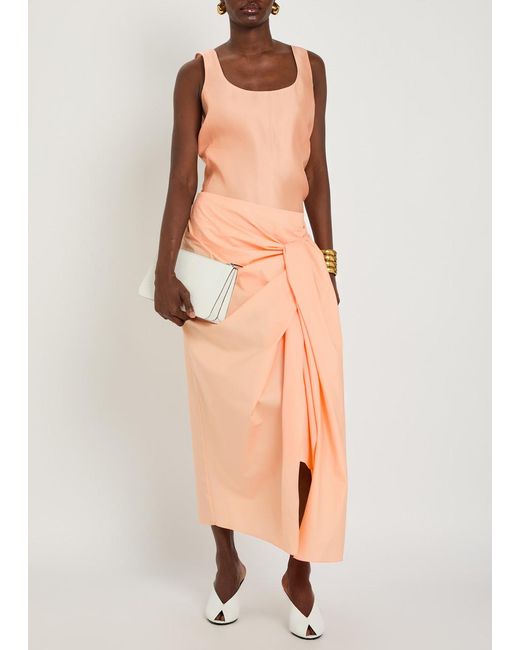 Khaite Orange Shay Asymmetric Cotton-Poplin Midi Wrap Skirt