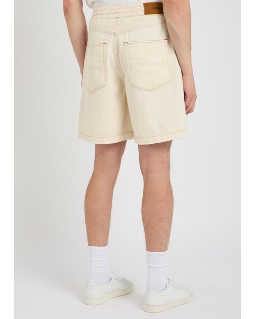 Amiri Natural Logo-Embossed Distressed Denim Shorts for men